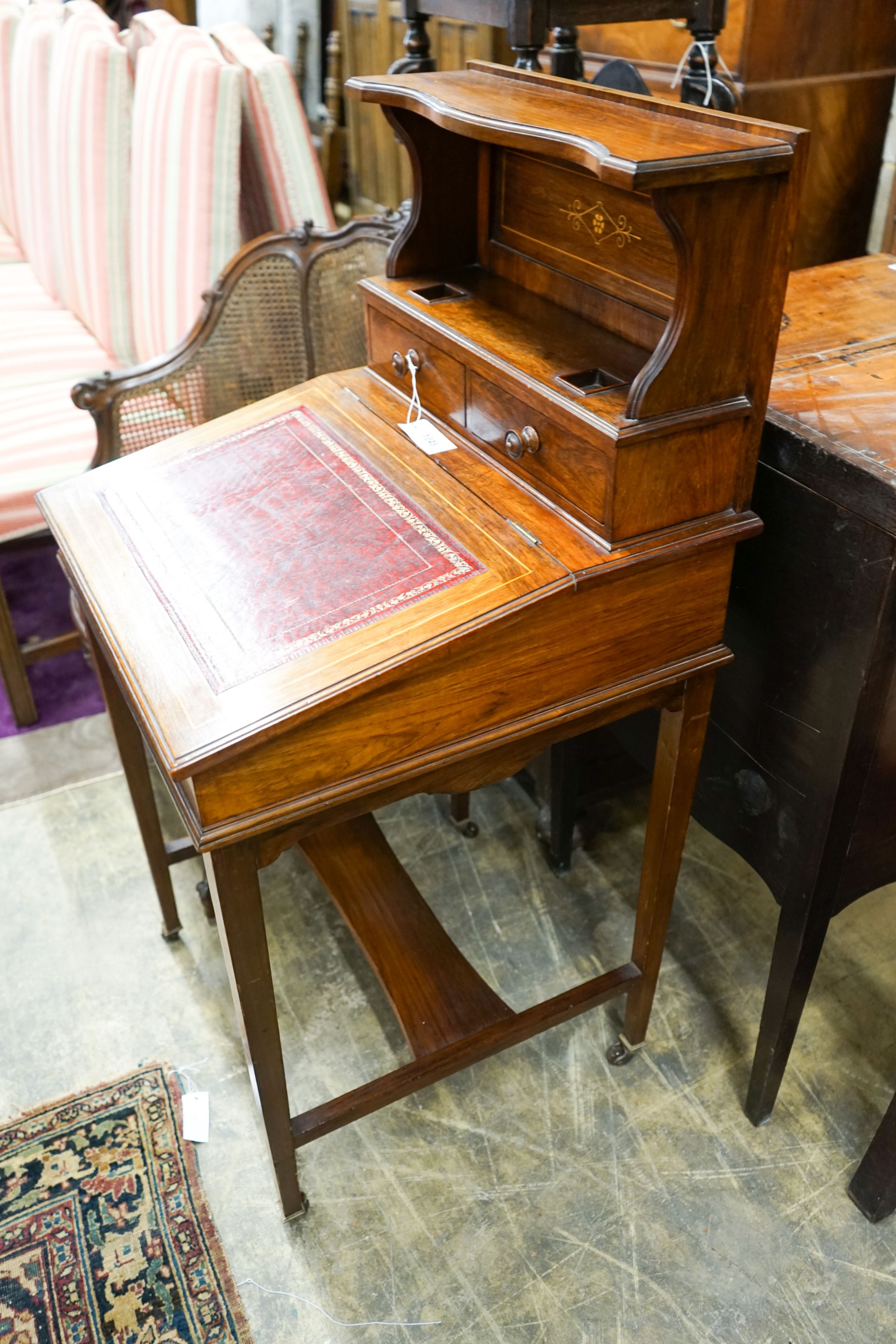 A late Victorian rosewood Davenport, width 53cm, depth 54cm, height 110cm